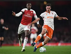 Arsenal V Blackpool Carabao Cup 2018-19 Prints: Arsenal's Danny Welbeck Closes In on Blackpool's Ben Heneghan in Carabao Cup Showdown