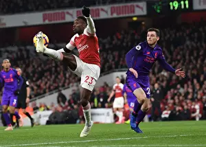 Arsenal V Liverpool 2018-19 Prints: Arsenal's Danny Welbeck Faces Off Against Liverpool's Andrew Robertson in Premier League Showdown