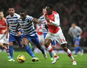 Arsenal V Queens Park Rangers 2014-15 Prints: Arsenal's Danny Welbeck Faces Off Against Nedum Onuoha in Premier League Clash