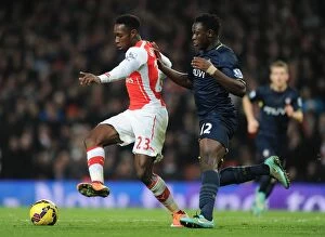 Images Dated 3rd December 2014: Arsenal's Danny Welbeck Fends Off Southampton's Victor Wanyama in Premier League Clash