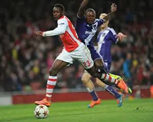Arsenal V Anderlecht 2014/15 Prints: Arsenal's Danny Welbeck Fouled by Chancel Mbemba: Penalty in UEFA Champions League Match vs