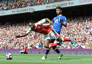 Arsenal's Danny Welbeck Fouled by Everton's Mason Holgate in Intense Premier League Clash