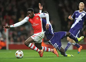 Arsenal V Anderlecht 2014/15 Prints: Arsenal's Danny Welbeck Fouls by Chancel Mbemba: Penalty Called in UEFA Champions League Match