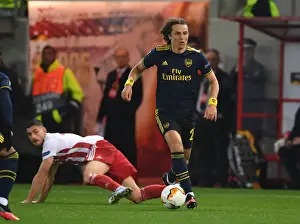 Arsenal's David Luiz Battles Past Olympiacos Guilherme in Europa League Clash