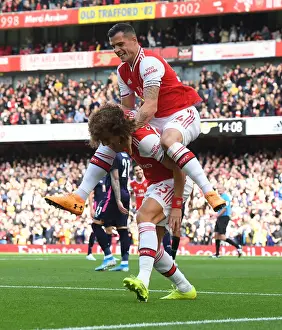 Arsenal V AFC Bournemouth 2019-20 Prints: Arsenal's David Luiz and Granit Xhaka: A Celebratory Moment after Scoring against AFC Bournemouth