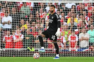 Arsenal's David Raya: Battling for Control in the Premier League Showdown between Arsenal and Manchester City (2023-24)