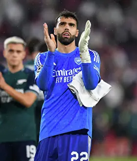Arsenal's David Raya: Celebrating with Fans after Securing Champions League Victory over Sevilla