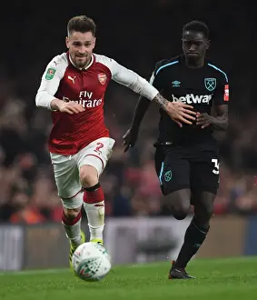 Arsenal V West Ham United - Carabao Cup 2017-18 Prints: Arsenal's Debuchy Clashes with West Ham's Quina in Carabao Cup Quarterfinal