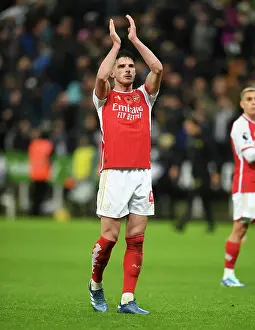 Arsenal's Declan Rice Celebrates with Fans after Newcastle Victory, 2023-24 Premier League