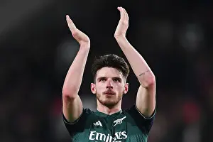PSV Eindoven V Arsenal 2023-24 Prints: Arsenal's Declan Rice Celebrates UEFA Champions League Victory with Fans at PSV Eindhoven