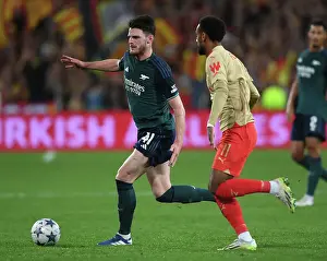 RC Lens V Arsenal 2023-24 Prints: Arsenal's Declan Rice Clashes with Angelo Fulgini in RC Lens Champions League Showdown