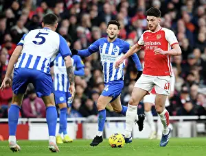 Arsenal V Brighton And Hove Albion 2023-24 Prints: Arsenal's Declan Rice Outruns Brighton's Adam Lallana in 2023-24 Premier League Clash