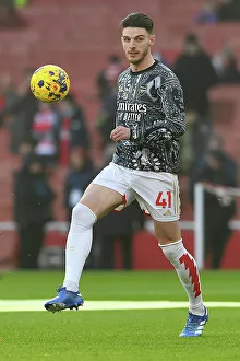 Arsenal's Declan Rice Prepares: Arsenal FC vs. Wolverhampton Wanderers, 2023-24 Premier League Clash at Emirates Stadium