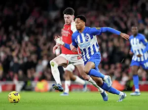 Arsenal's Declan Rice Tackles Joao Pedro: Arsenal FC vs Brighton & Hove Albion, Premier League 2023-24