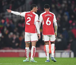 Arsenal's Defense Duo: Saliba and Magalhaes Celebrate after Arsenal v Wolverhampton Wanderers in 2023-24 Premier League