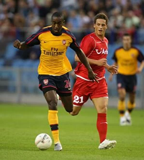 FC Twente v Arsenal Collection: Arsenal's Djourou Shines in 2-0 Champions League Victory over FC Twente's Arnautovic
