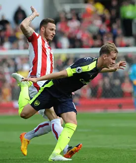 Stoke City V Arsenal 2016-17 Prints: Arsenal's Dominance: Rob Holding Scores Against Marko Arnautovic as Arsenal Thrash Stoke 4-1 in Premier League