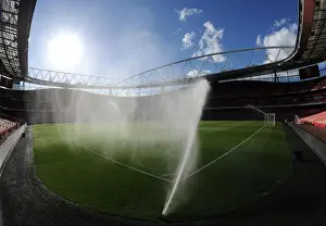 Arsenal V Burnley 2014/15 Prints: Arsenal's Dominant Performance: 3-0 Victory Over Burnley in a Wet Emirates Stadium (2014)