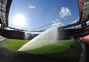 Arsenal V Burnley 2014/15 Prints: Arsenal's Dominant Performance: 3-0 Victory Over Burnley in a Wet Emirates Stadium (2014)