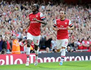 Arsenal's Dominant Performance: Gervinho and Cazorla Celebrate Arsenal's First Goal in 6-1 Victory over Southampton