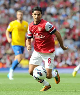 Arsenal's Dominant Victory: Mikel Arteta Leads Arsenal to a 6-1 Win over Southampton in the Premier League (15/9/12, Emirates Stadium)