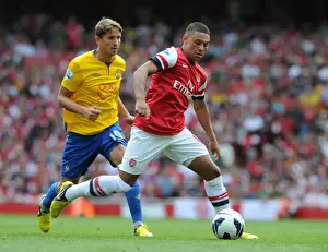 Arsenal V Southampton 2012:13 Prints: Arsenal's Dominant Victory: Oxlade-Chamberlain Shines in 6-1 Rout of Southampton