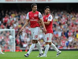 Images Dated 24th September 2011: Arsenal's Dominant Victory: Robin van Persie and Mikel Arteta Lead the Way against Bolton