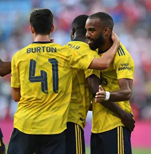 Arsenal's Double Act: Nketiah and Lacazette Celebrate Goals Against Fiorentina in 2019 International Champions Cup