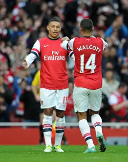 Arsenal's Double Act: Walcott and Oxlade-Chamberlain Celebrate Goal Against Tottenham (2012-13)
