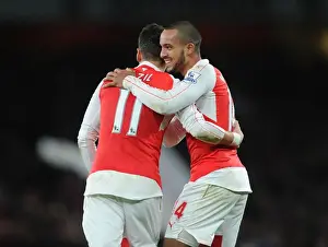Arsenal's Double Celebration: Walcott and Ozil's Goal Connection Against Manchester City (2015-16)