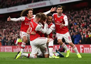 Arsenal's Double Delight: David Luiz and Teammates Celebrate Goals Against Crystal Palace (2019-20)