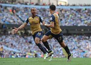Manchester City V Arsenal 2105-16 Prints: Arsenal's Double Delight: Sanchez and Walcott Celebrate Goals Against Manchester City (May 2016)