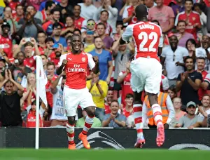 Arsenal V Benfica 2014-15 Prints: Arsenal's Double Strike: Sanogo and Campbell Celebrate Goals Against Benfica (2014 Emirates Cup)