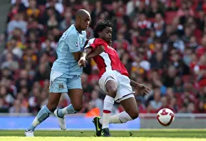 Arsenal V Manchester City 2008-09 Prints: Arsenal's Double Victory: Alex Song Shines in 2:0 Win over Manchester City
