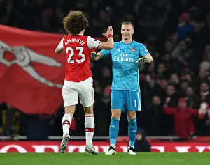 Arsenal V Manchester United 2019-20 Prints: Arsenal's Double Victory: Luiz and Leno Celebrate Goals Against Manchester United (2019-20)