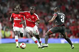 Arsenal V FC Twente 2008-09 Prints: Arsenal's Double Victory Over Twente: Eboue Shines in 4-0 UEFA Champions League Win