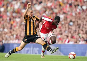 Arsenal V Hull City 2008-9 Prints: Arsenal's Eboue Clashes with Hull's Marney: 1-2 Loss in Premier League