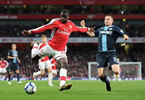 Arsenal V West Ham United 2009-10 Prints: Arsenal's Eboue Scores Duo Against West Ham's Daprela in 2010 Premier League Clash