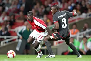 Arsenal's Eboue Shines in Dominant 4:0 Win over Twente's Braafheid
