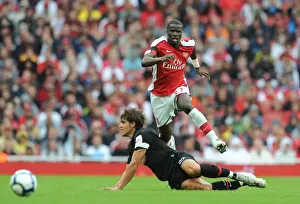 Arsenal V Athletico Madrid 2009-10 Prints: Arsenal's Eboue vs. Dominguez: A Battle at the Emirates Cup, 2009
