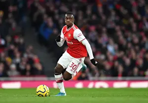 Arsenal V Newcastle United 2019-20 Prints: Arsenal's Eddie Nketiah in Action against Newcastle United - Premier League 2019-2020