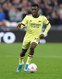 West Ham United V Arsenal 2021-22 Prints: Arsenal's Eddie Nketiah in Action against West Ham United - Premier League Showdown