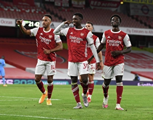 Arsenal's Eddie Nketiah, Aubameyang, and Saka Celebrate Goals Against West Ham United (2020-21)