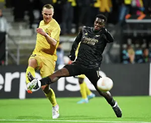 Bodø/Glimt V Arsenal 2022-23 Prints: Arsenal's Eddie Nketiah Clashes with Bodo/Glimt's Sery Larsen in Europa League Match