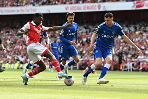 Arsenal V Everton 2021-22 Prints: Arsenal's Eddie Nketiah Clashes with Everton's Michael Keane in Intense Premier League Showdown