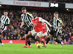 Arsenal V Newcastle United 2022-23 Prints: Arsenal's Eddie Nketiah Clashes with Newcastle's Fabian Schar in Premier League Showdown