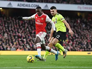 Arsenal's Eddie Nketiah Clashes with Sheffield United's John Egan in Premier League Showdown