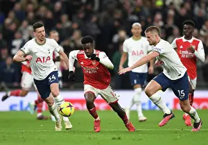Tottenham Hotspur V Arsenal 2022-23 Prints: Arsenal's Eddie Nketiah Clashes with Tottenham's Lenglet and Dier in Premier League Showdown