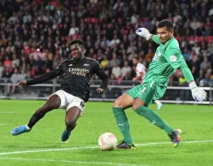 PSV Eindhoven V Arsenal 2022-23 Prints: Arsenal's Eddie Nketiah Closes In on PSV Goalkeeper during Europa League Clash