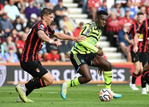 Arsenal's Eddie Nketiah Faces Off Against AFC Bournemouth's Illya Zabarnyi in Premier League Clash (2023-24)
